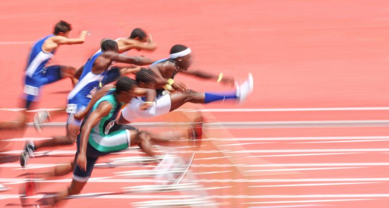 Jumping over hurdles, motion blur Jumping over hurdles, motion blur