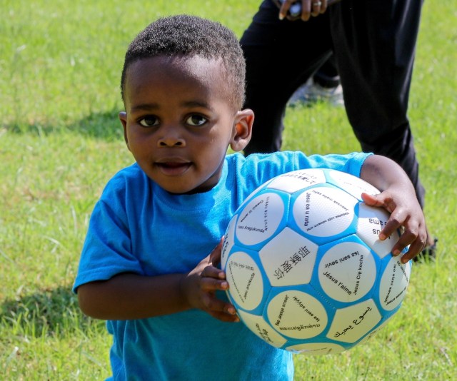 Boy holding a soccer ball
