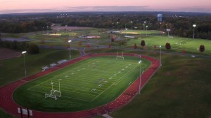 The lighted football field and all-weather track at Athletes in Action Sports Complex in Xenia.  Built on land from the former Ohio Veteran's Children's Home, Athletes in Action installed seven synthetic turf playing fields in 2006 including two soccer, two softball, one baseball and one football field.  TY GREENLEES / STAFF