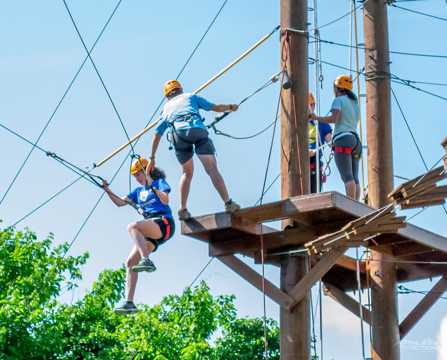 Athletes on the high ropes course at the AIA campus in Xenia, Ohio