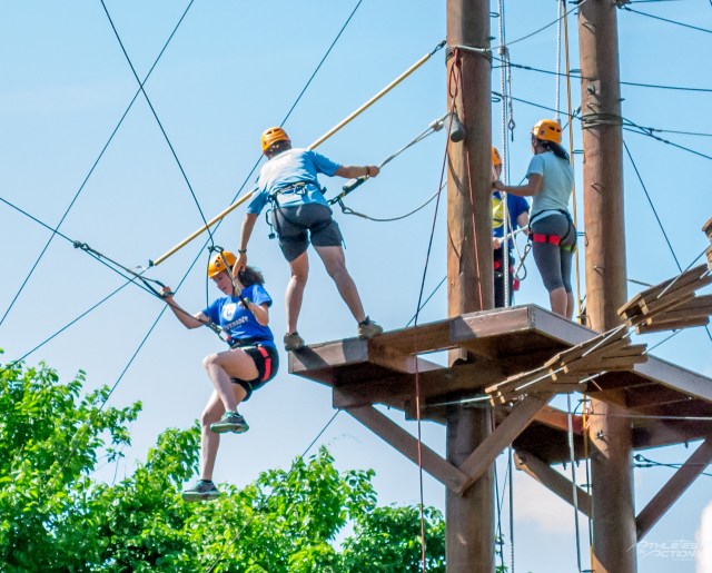 Athletes on the high ropes course at the AIA campus in Xenia, Ohio