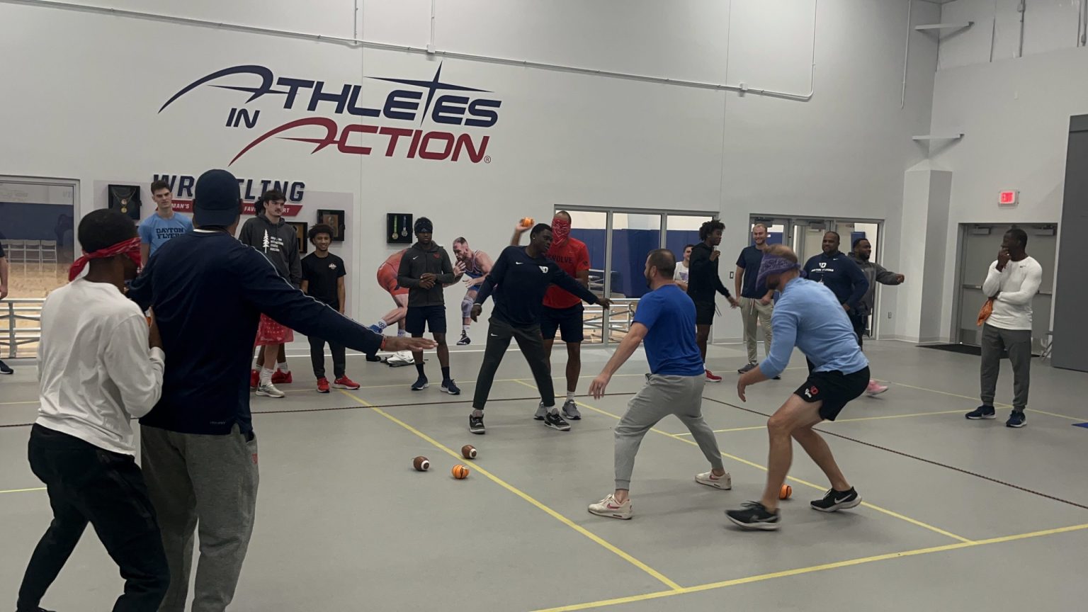 College athletes in a team-building drill in the Fieldhouse