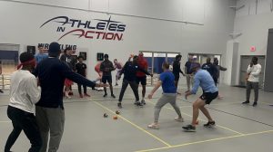 College athletes in a team-building drill in the Fieldhouse