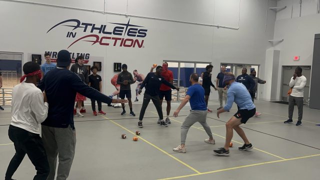College athletes in a team-building drill in the Fieldhouse