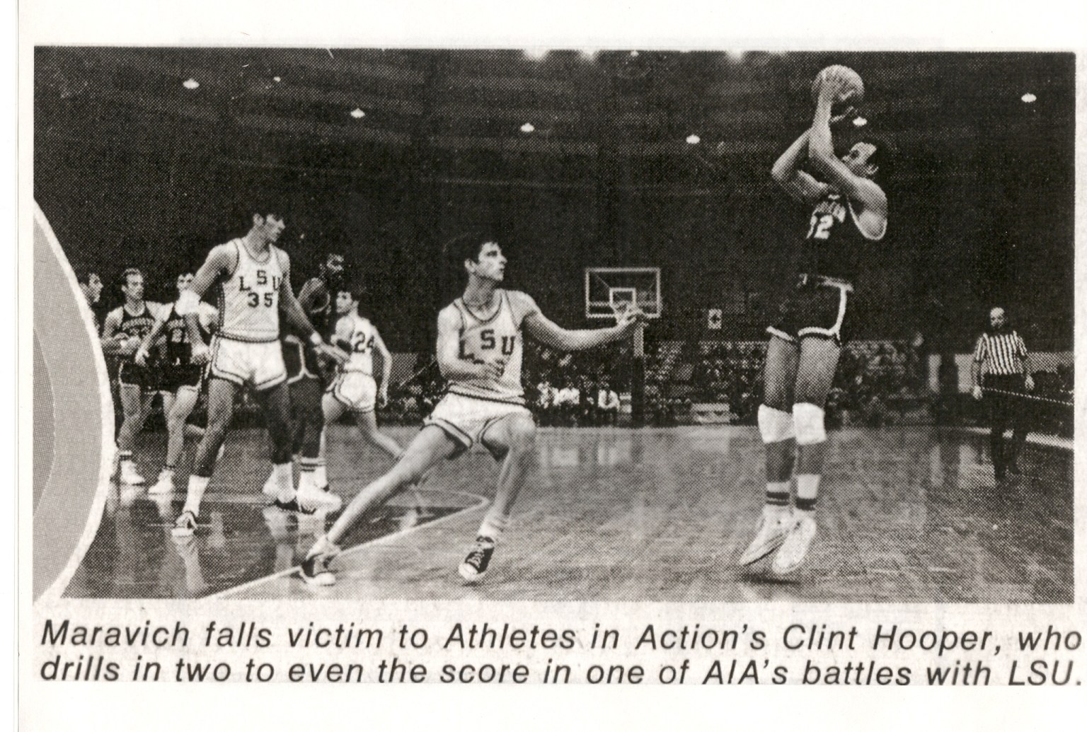 1970s newspaper clipping of an Athletes in Action basketball game