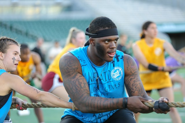 Athlete pulling hard in a tug of war at Ultimate Training Camp
