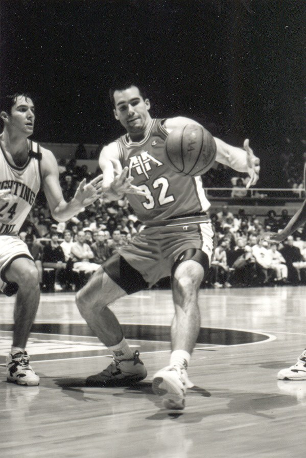 Athletes in Action men’s basketball player in a 1990s game