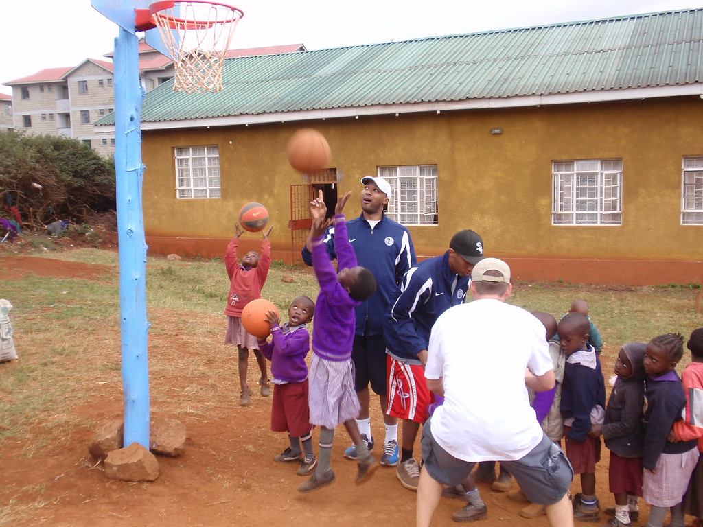Playing basketball with kids on an international trip