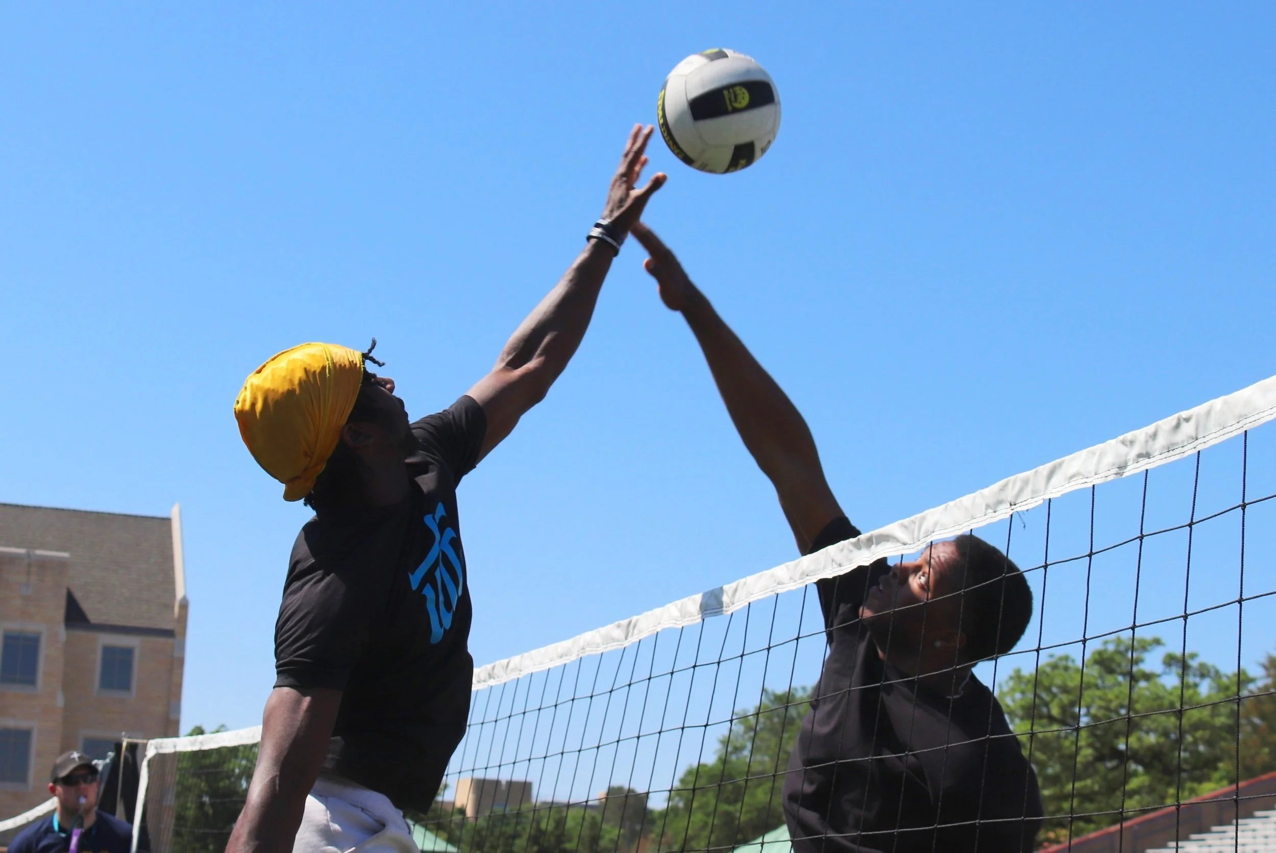 Athletes competing in a volleyball lab at UTC