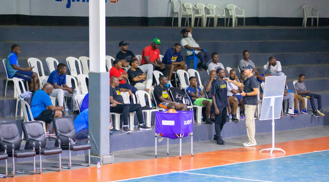 Coaches gathered at an AIA basketball coaching clinic
